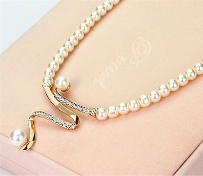 Natural Pearl Necklace + Earrings Set by Rose & Oliver - product image 4