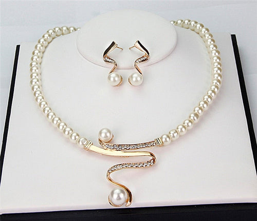 Natural Pearl Necklace + Earrings Set by Rose & Oliver - product image 1