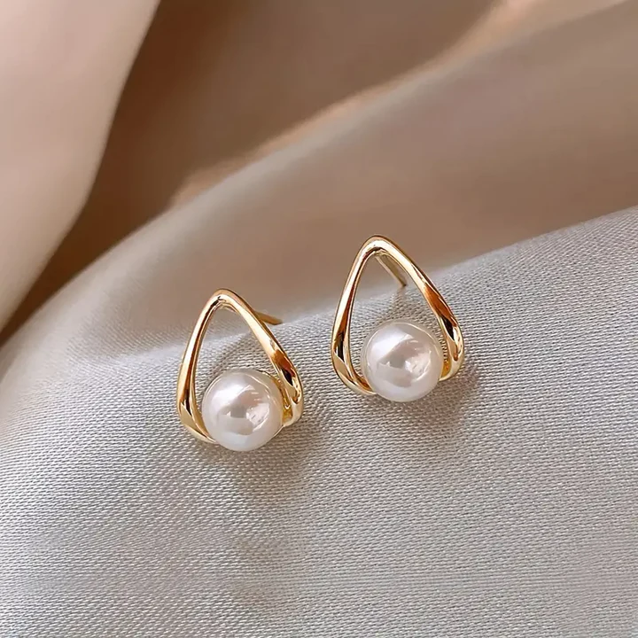 Elegantr Hollow Triangle Pearl Earrings by Rose & Oliver - product image 1