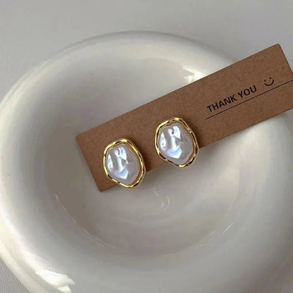 Elegant Pearl Earrings by Carmen